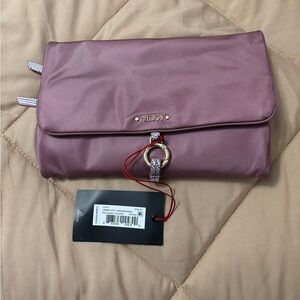Tumi Mauve Jewelry Travel roll